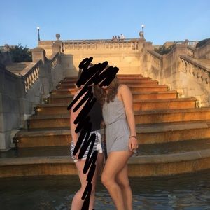 Grey Romper with a cross cross open back!